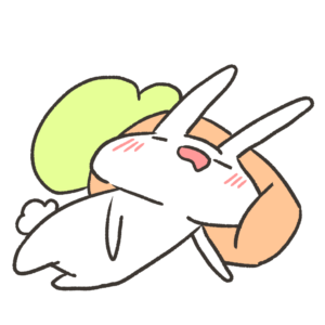 にんじんの枕で寝るうさぎのイラスト
