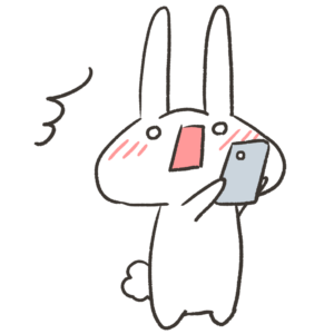 スマホを見ながら驚いた顔をしてるうさぎのイラスト